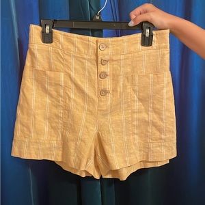 Yellow summer striped shorts.